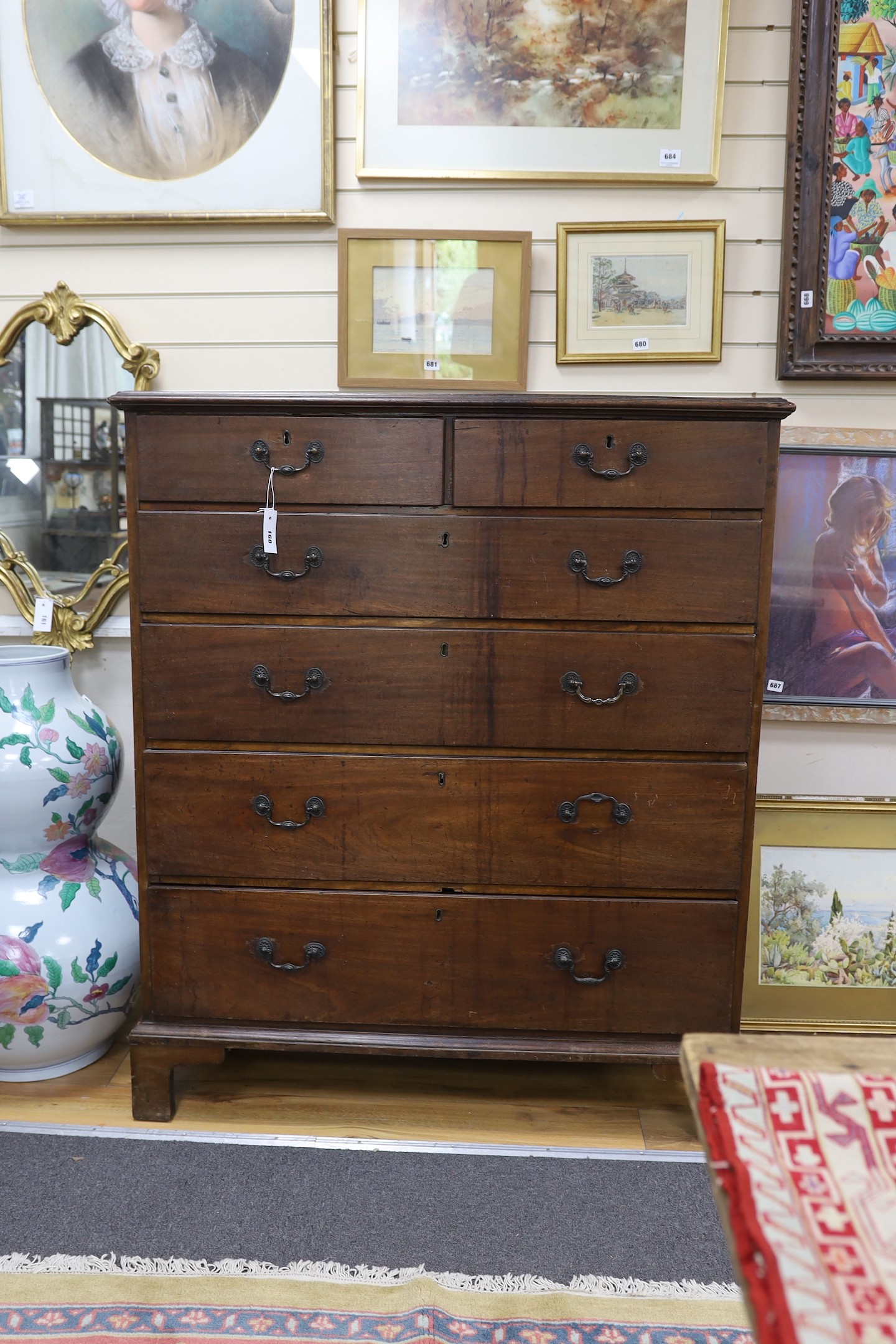 A tall George III mahogany chest, width 110cm, depth 52cm, height 130cm